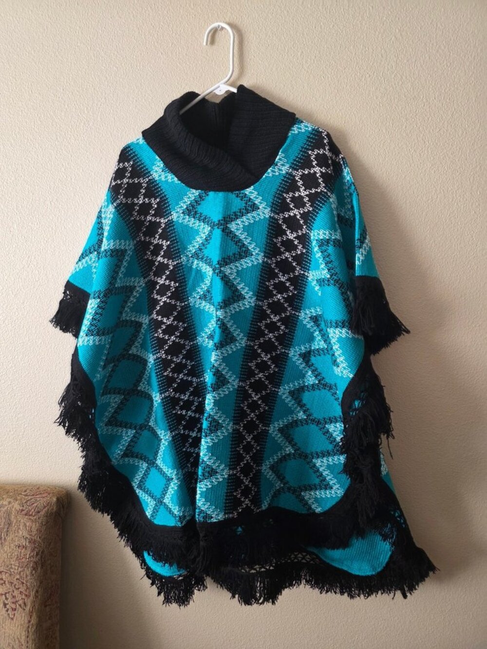 Turquoise and Black Geometric Fringe Poncho Sweater